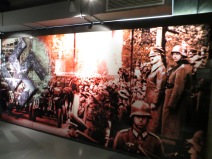 Large panel showing a nazi march-past